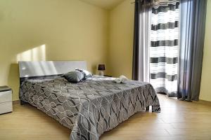 Ένα ή περισσότερα κρεβάτια σε δωμάτιο στο Villa Serena - vasca idromassaggio