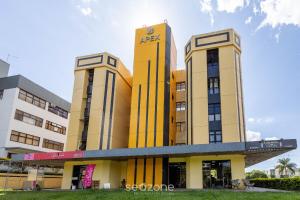 a building with two tall buildings at Studio Moderno em Lago Norte SHL0105 in Brasilia
