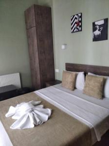 Voodi või voodid majutusasutuse Magic Hotel toas