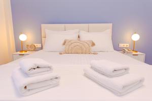 Posteľ alebo postele v izbe v ubytovaní Hotel Ilion