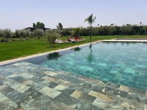 Bazén v ubytování Villa 20 minutes from Marrakech nebo v jeho okolí