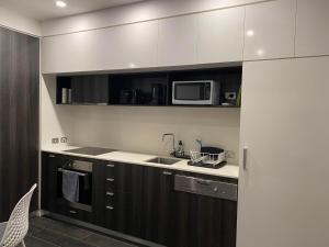 Modern Quiet 1 & 2 Bed Apt Opposite Albert Park 주방 또는 간이 주방