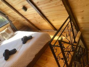 Postel nebo postele na pokoji v ubytování Vila Deniri