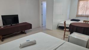 TV a/nebo společenská místnost v ubytování Ciity Hotel ijui