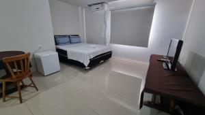 Postel nebo postele na pokoji v ubytování Ciity Hotel ijui