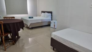 Postel nebo postele na pokoji v ubytování Ciity Hotel ijui