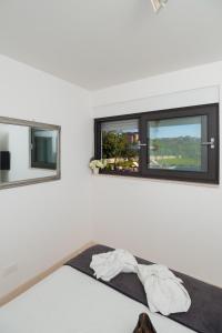 Posteľ alebo postele v izbe v ubytovaní Luxury Villa Luminosa + 37 fotografií