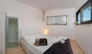 Posteľ alebo postele v izbe v ubytovaní Luxury Villa Luminosa