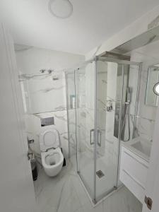 Koupelna v ubytování Exotic Home + 7 fotografií