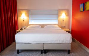 Krevet ili kreveti u jedinici u okviru objekta Park Inn by Radisson Linz
