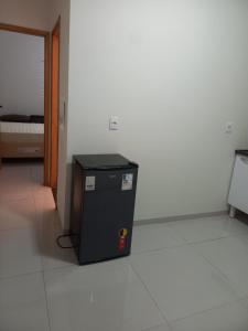a black cpu sitting in the middle of a room at Teixeira in Olímpia