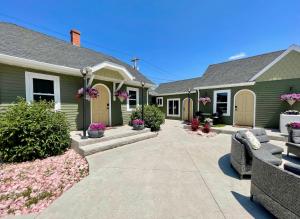a home with a patio and a house at EO Bungalows, Black Hills in Custer