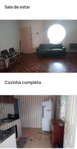 a living room with a couch and a refrigerator at Excelente casa de praia com piscina in Salinópolis