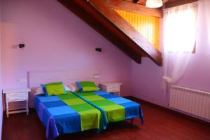 Postel nebo postele na pokoji v ubytování Casa Nery