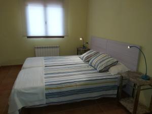 Postel nebo postele na pokoji v ubytování Casa Nery