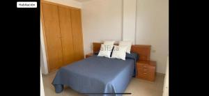 Voodi või voodid majutusasutuse Apartamento PLAYANALA toas