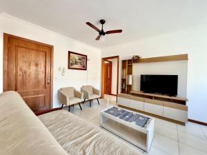 Μια τηλεόραση ή/και κέντρο ψυχαγωγίας στο Melhor custo beneficio, 2 quartos, suíte, 3 splits , wi-fi +18 φωτογραφίες