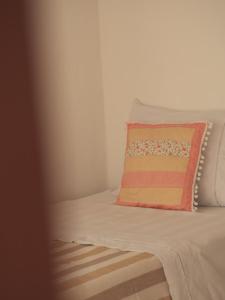Postel nebo postele na pokoji v ubytování Vila Rita Hostel Arraial d'Ajuda