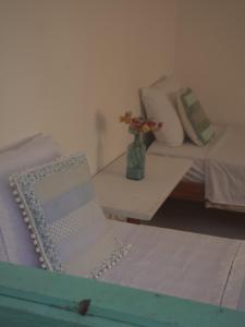 Postel nebo postele na pokoji v ubytování Vila Rita Hostel Arraial d'Ajuda