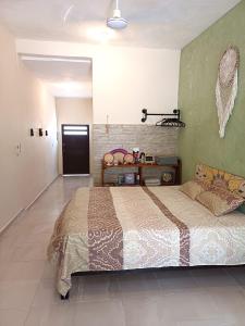 Postel nebo postele na pokoji v ubytování Casa Candelita + 18 fotografií