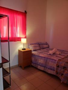 En eller flere senge i et værelse på Casita bonita Ecoterra + 27 billeder