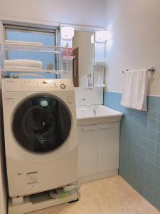 福岡市にある大和戸建のバスルーム(洗濯機、シンク付) +23枚の写真