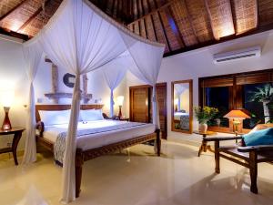 Ein Bett oder Betten in einem Zimmer der Unterkunft Villa Kedidi