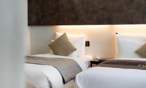 CM Park Hotel客房内的一张或多张床位