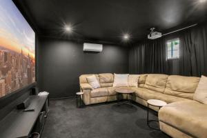a living room with a couch and a table at Esplanade 180, Golden Beach in Golden Beach