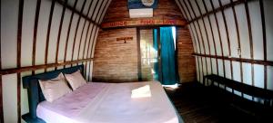 Postel nebo postele na pokoji v ubytování Oceansoul Gili Trawangan