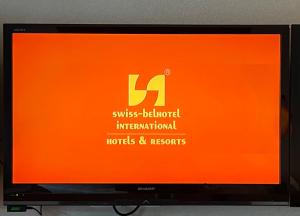 TV a/nebo společenská místnost v ubytování Swiss-Belinn Malang