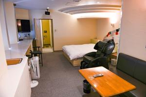 TV a/nebo společenská místnost v ubytování Hotel HERB ホテルハーブ大人用