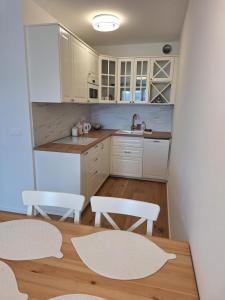 Kuchyň nebo kuchyňský kout v ubytování Apartmány Ski&Bike Siréna