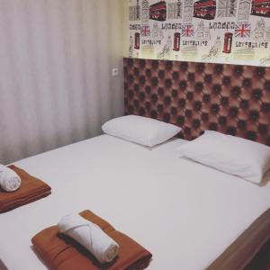 Postel nebo postele na pokoji v ubytování FixOn Capsule Hotel + 8 fotografií