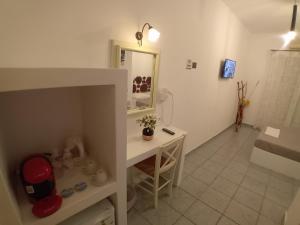 Kúpeľňa v ubytovaní Nikolas ios Village