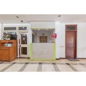 Hall o reception di Urbanview Hotel Utari