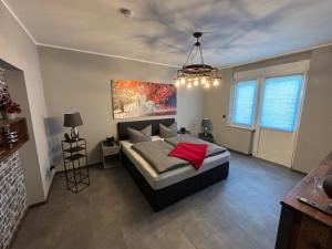 Postel nebo postele na pokoji v ubytování Ferienhaus Deluxe