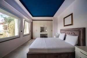 Postel nebo postele na pokoji v ubytování Epirus Hotel