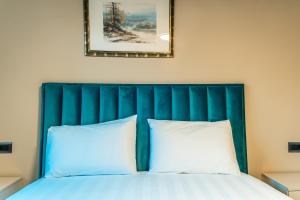 Postel nebo postele na pokoji v ubytování Epirus Hotel