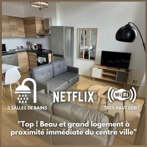 Televízia a/alebo spoločenská miestnosť v ubytovaní Bel Appart' 3 chambres 3 Sdb au centre-ville St Etienne