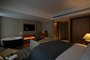 Letto o letti in una camera di Phoenix Hall House Hotel