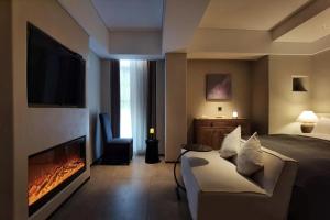 Letto o letti in una camera di Phoenix Hall House Hotel