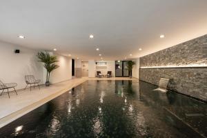 Bazén v ubytování Melchtal Resort Apart Hotel nebo v jeho okolí