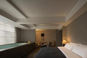 Letto o letti in una camera di Phoenix Hall House Hotel