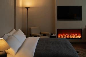 Letto o letti in una camera di Phoenix Hall House Hotel