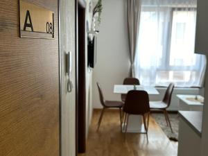 Zona d'estar a Divčinova Apartman 008