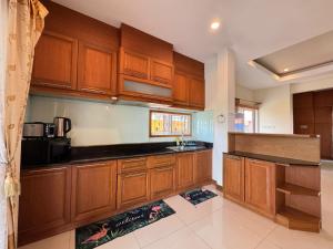 Η κουζίνα ή μικρή κουζίνα στο Neolin Asia Pool Villa