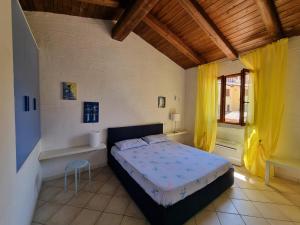 Postel nebo postele na pokoji v ubytování VILLA TRAMONTI SUL MARE