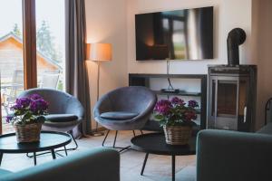 Khu vực ghế ngồi tại Vila nad jezerem Lipno