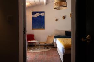 Oustau Camarguen Hôtel & Spa客房内的一张或多张床位